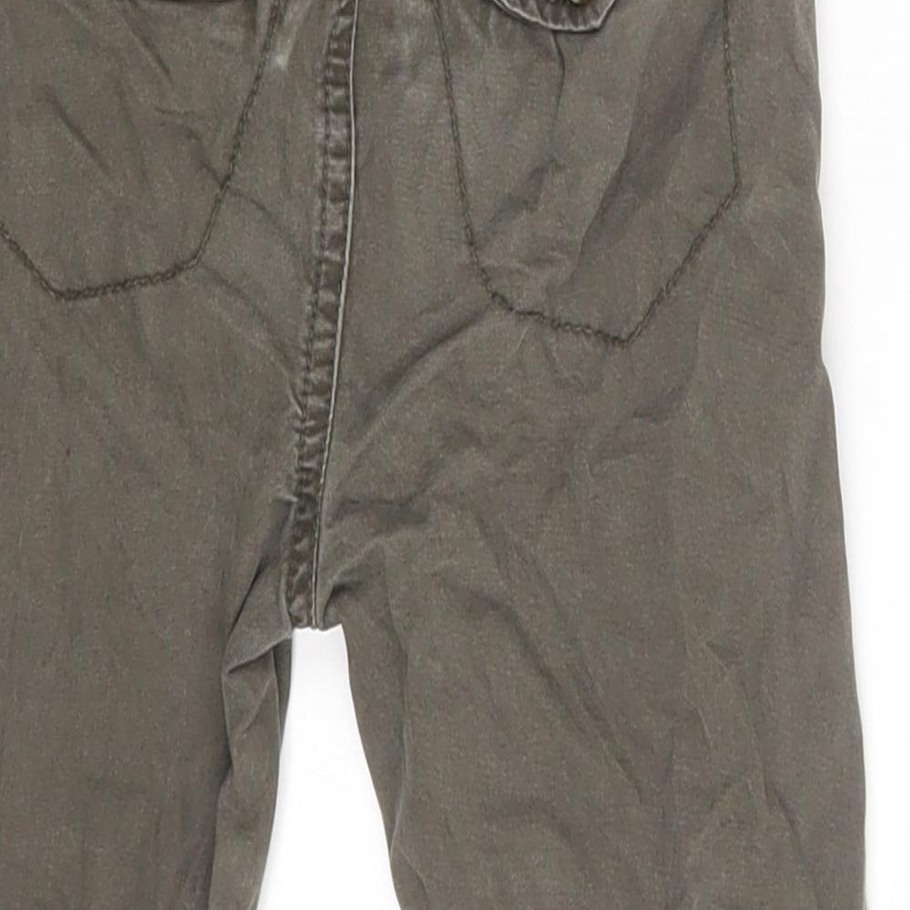 Brand and care label for Matalan boys’ brown cropped trousers, size 12-18, months - waist 16in; inside leg 12
