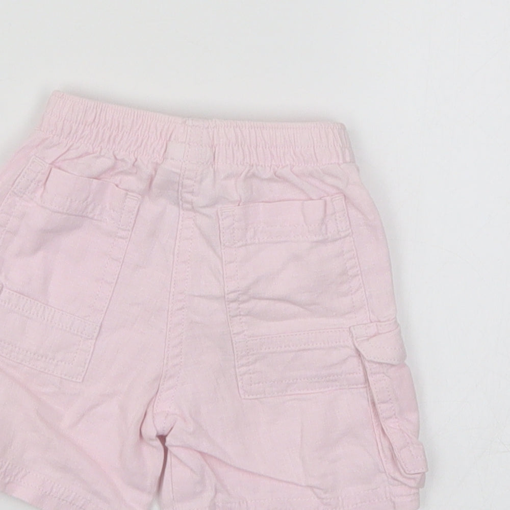 Brand and care label for Next girls’ pink cargo trousers size newborn - shorts
