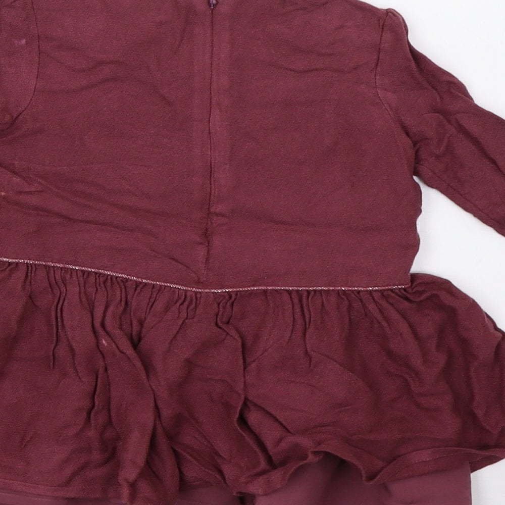 Brand and care label for F&F girls’ purple a-line, size 18-24, months