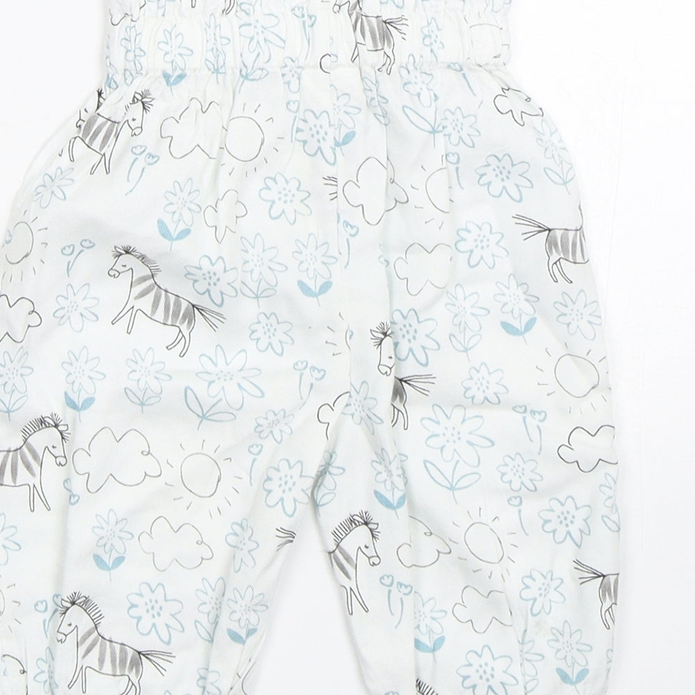 Brand and care label for Marks & Spencer Baby White Floral sweatpants, size 0-3, Months