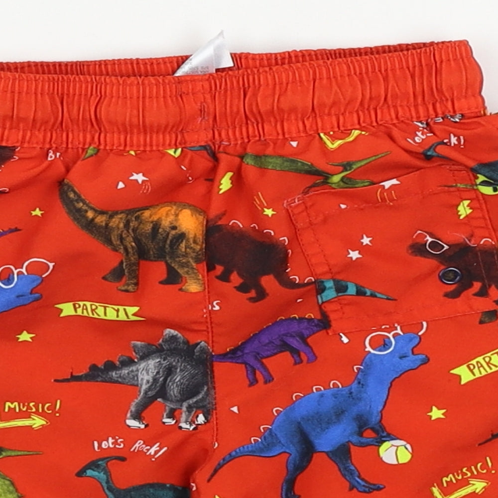 Brand and care label for George boys’ red cropped trousers, size 12-18, months