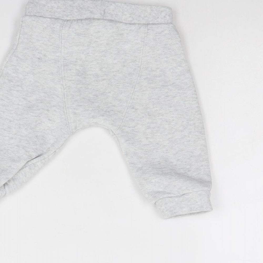 Brand and care label for F&F Baby Grey Jogger Trousers, size 6-9, Months