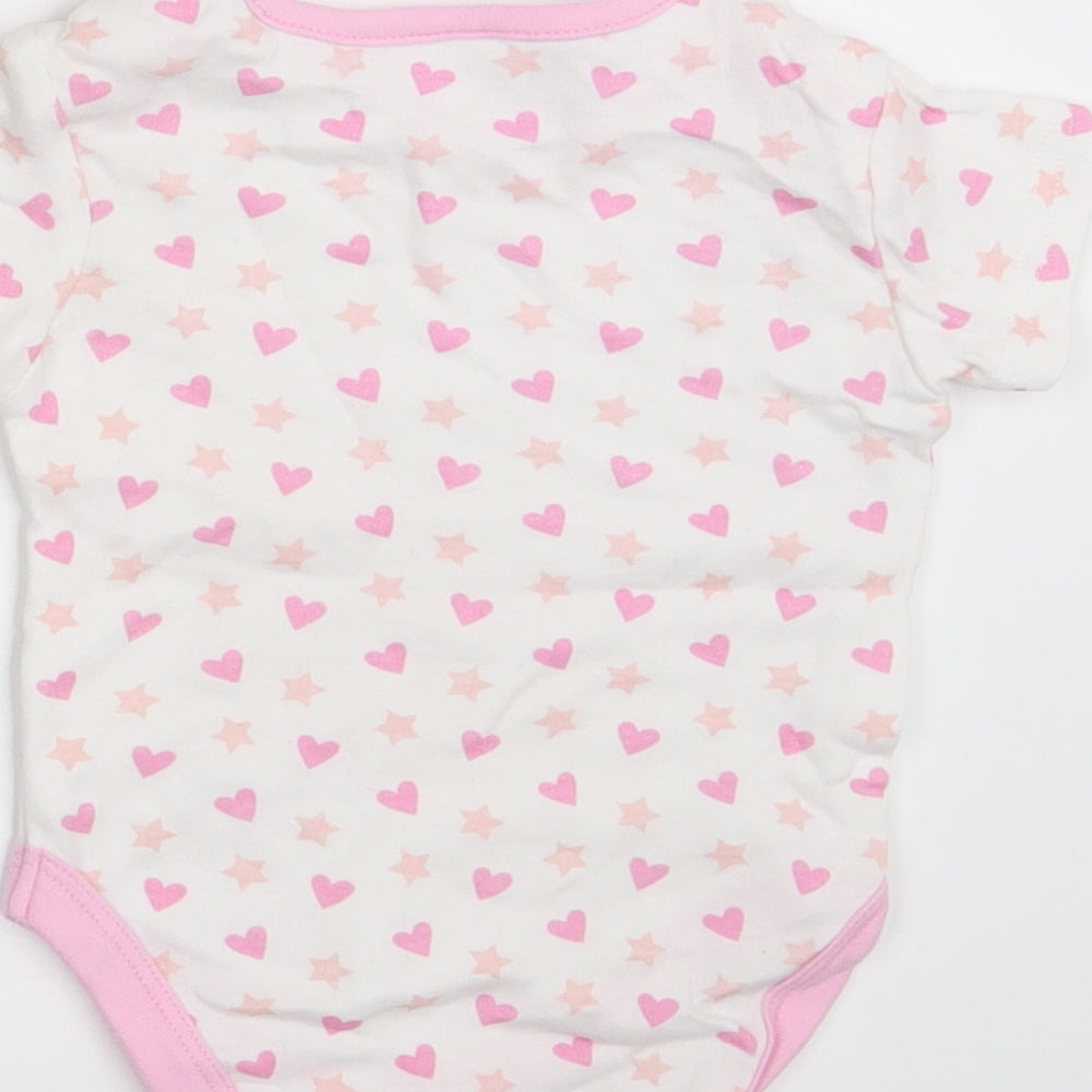 Brand and care label for I Love my Unicorn girls’ white polka dot basic t-shirt, size 6-9, months