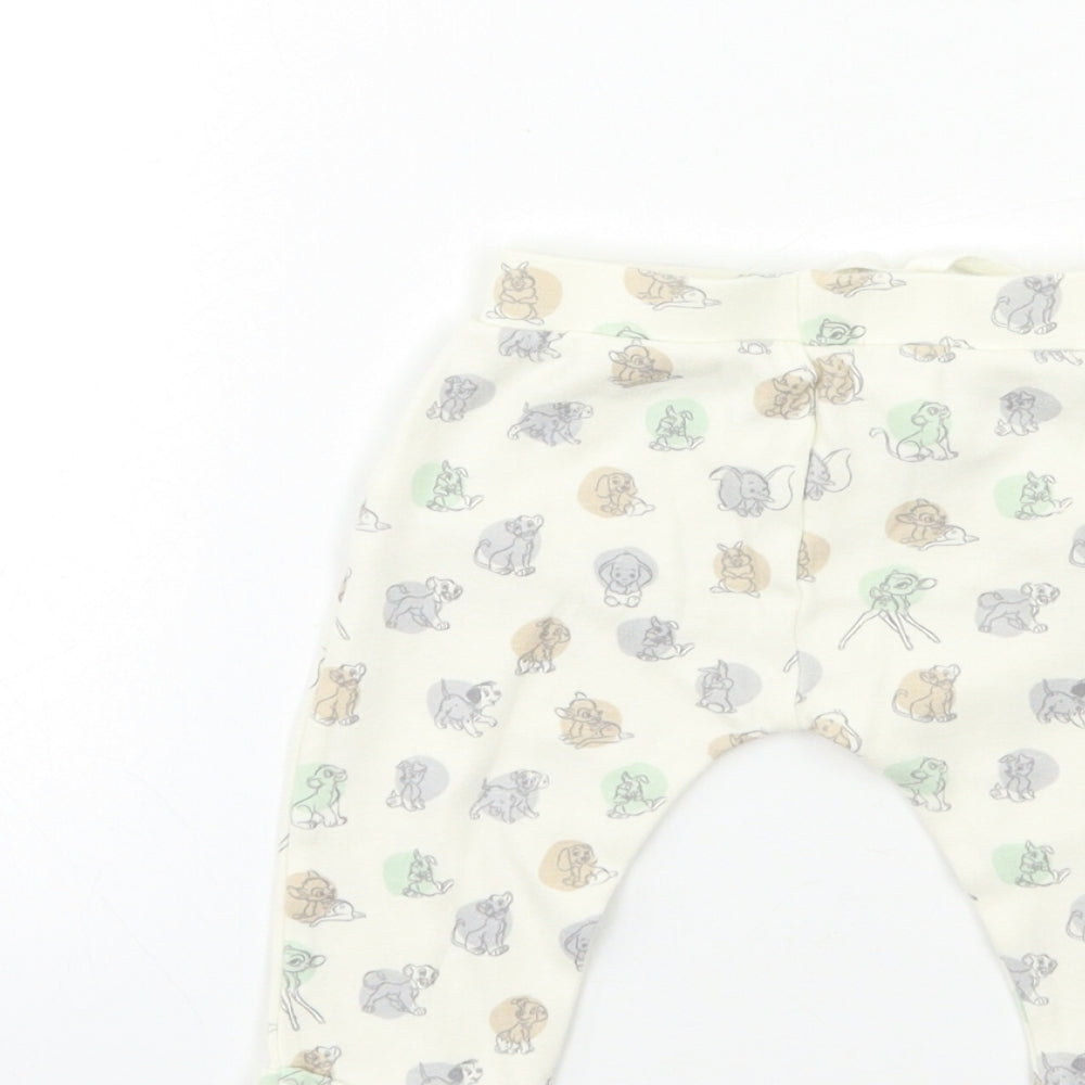 Brand and care label for George Baby Beige Animal Print Jogger Trousers, size 3-6, Months - Lion king