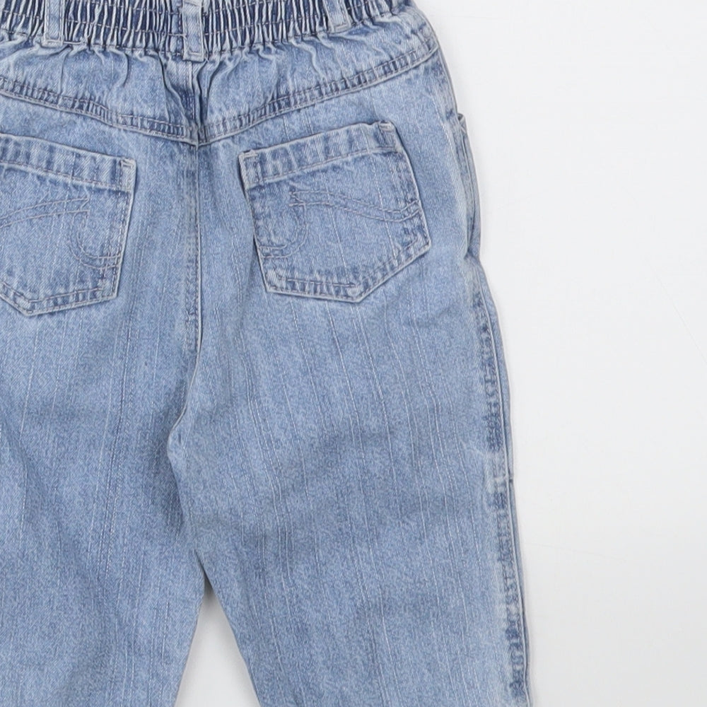 Brand and care label for George girls’ blue capri jeans, size 6-9, months