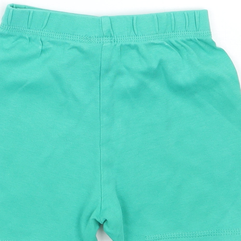Brand and care label for George Baby Green Capri Trousers, size 12, Months