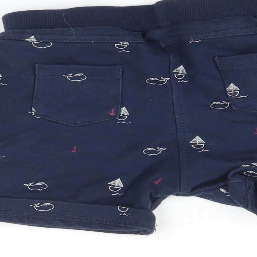 Brand and care label for Debenhams boys’ blue trousers, size 12-18, months - boat print