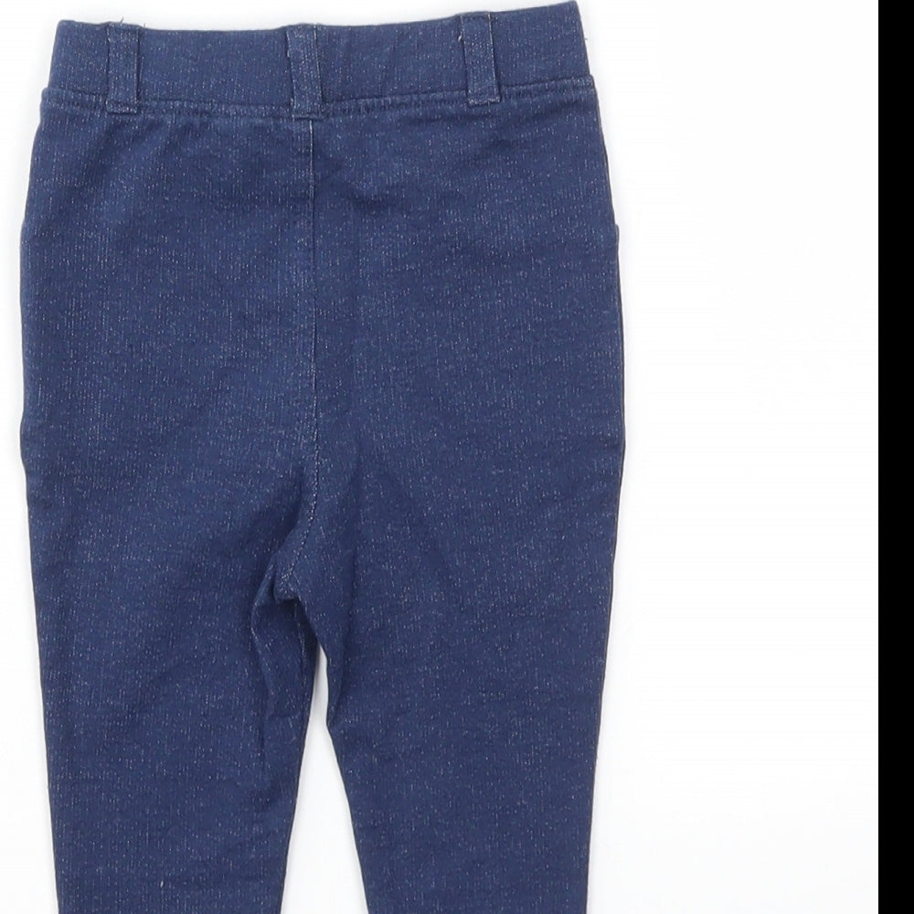 Brand and care label for JHON LEWIS girls’ blue jogger jeans, size 3-6, months