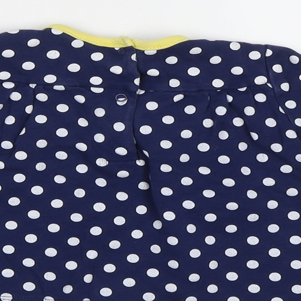 Brand and care label for Little Me Baby Black Polka Dot A-Line, size 12, Months