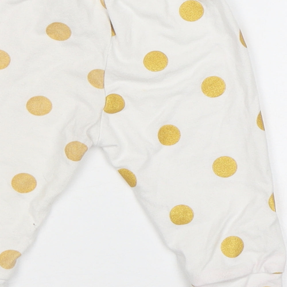 Brand and care label for Preworn Baby White Polka Dot Jogger Leggings, size 0-3, Months
