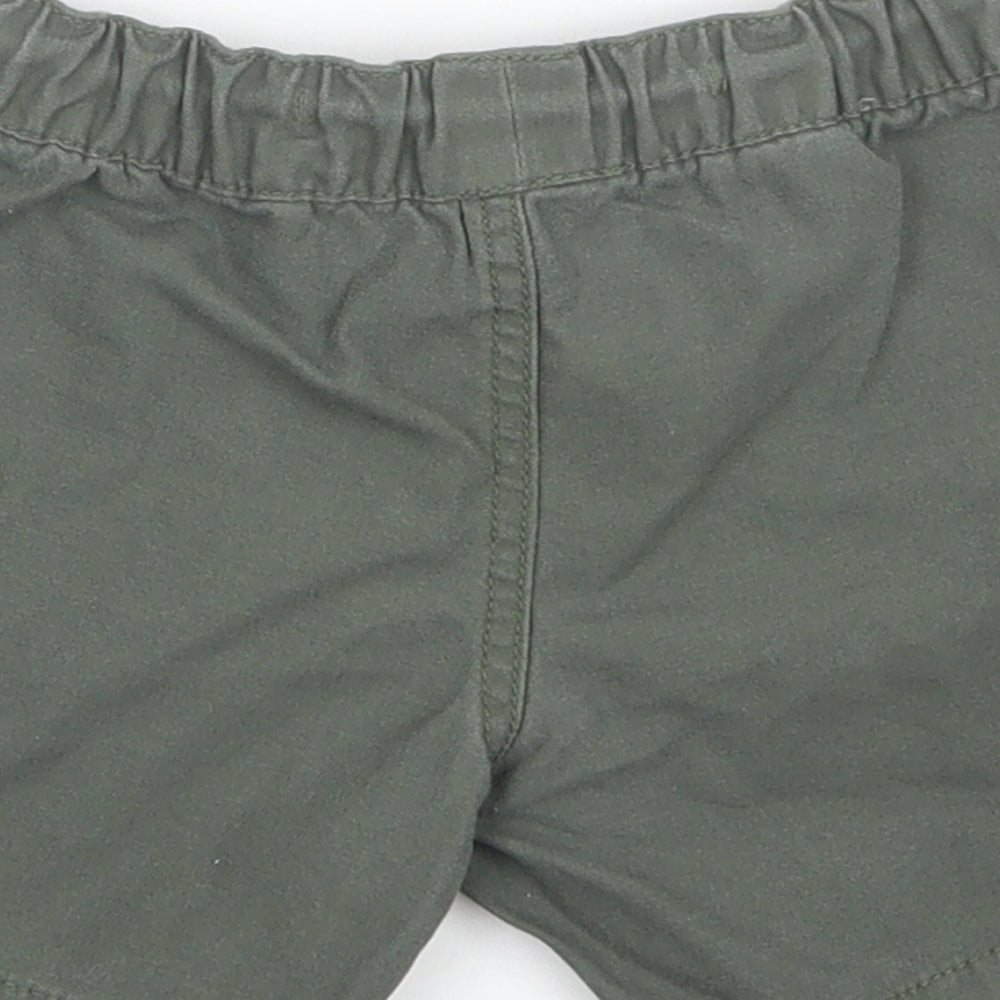 Brand and care label for denim co boys’ green cargo trousers, size 18-24, months