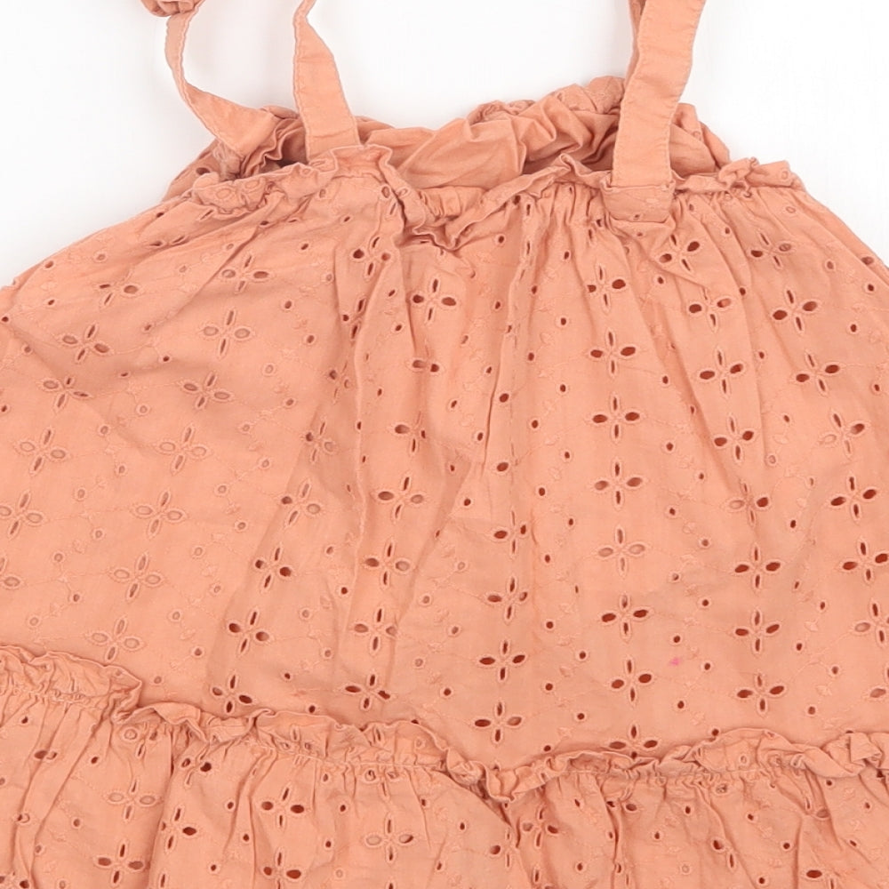 Brand and care label for George girls’ orange a-line, size 18-24, months