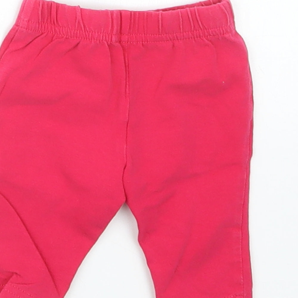 Brand and care label for George girls’ pink capri trousers size newborn