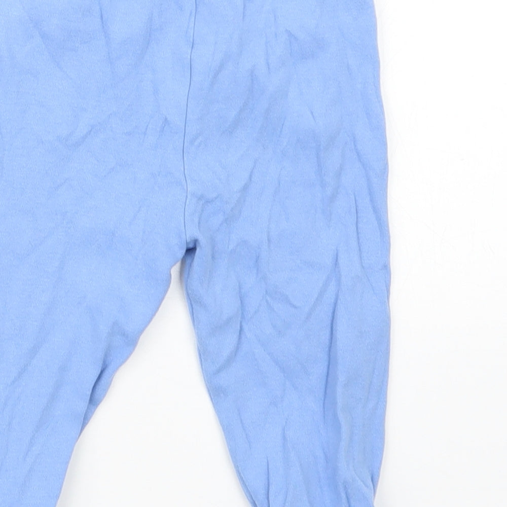 Brand and care label for George boys’ blue geometric capri pyjama pants, size 9-12, months