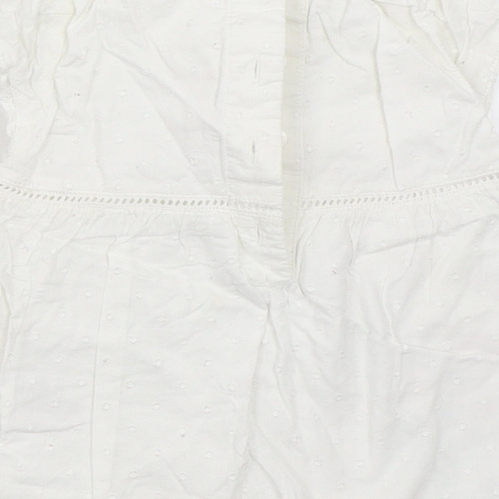 Brand and care label for Next girls’ white fit & flare, size 3-6, months