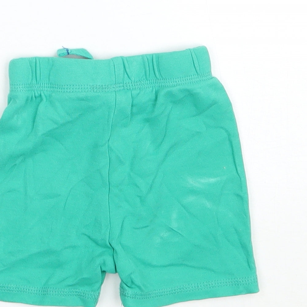 Brand and care label for George boys’ green cropped trousers, size 3-6, months