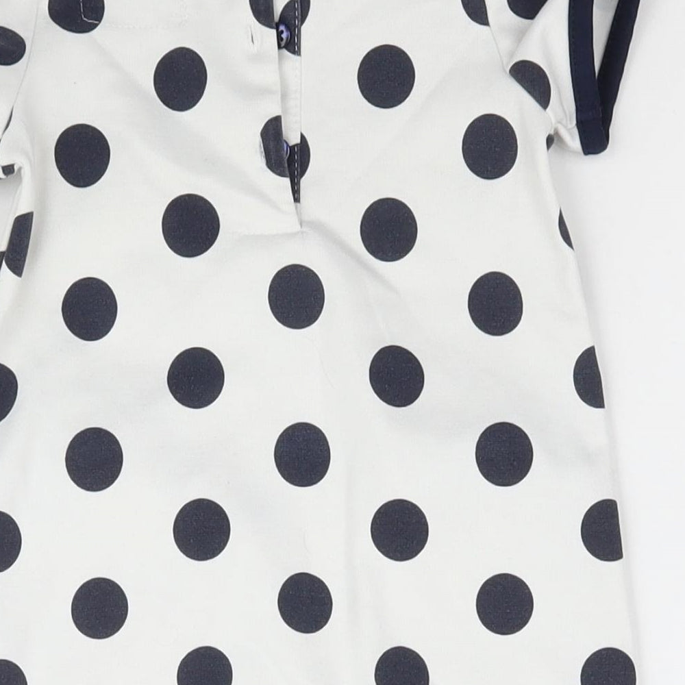 Brand and care label for Primark girls’ multicoloured polka dot shift, size 3-6, months