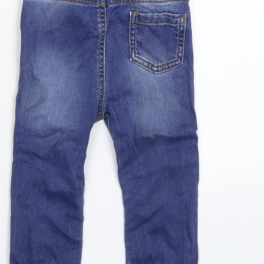 Brand and care label for Nutmeg Baby Blue Denim Capri Jeans, size 12-18, Months