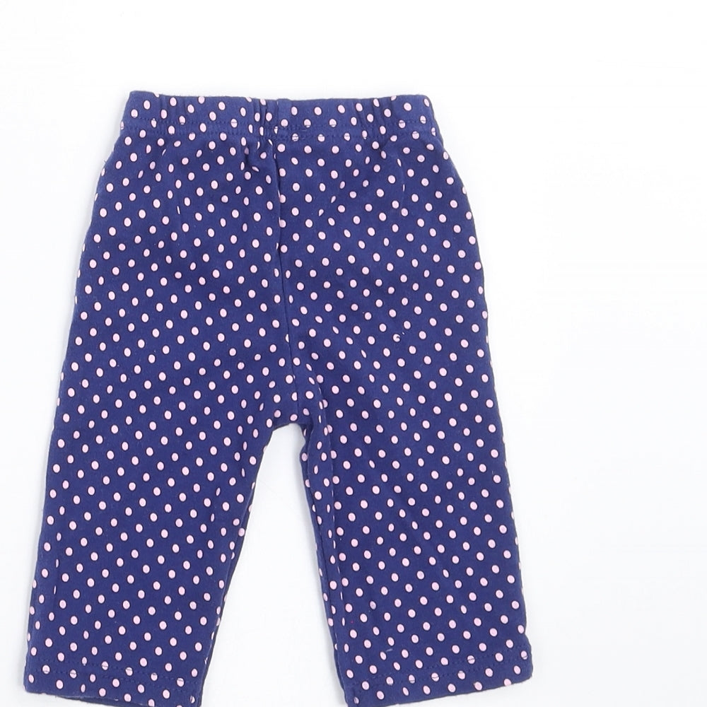 Brand and care label for Preworn girls’ blue polka dot leggings, size 3-6, months