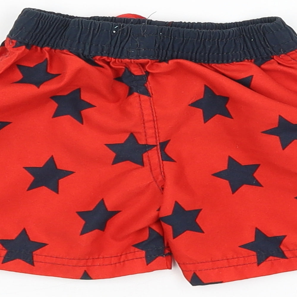 Brand and care label for Little Rebel Baby Red Geometric Cropped Trousers, size 9-12, Months - STAR PATTERN