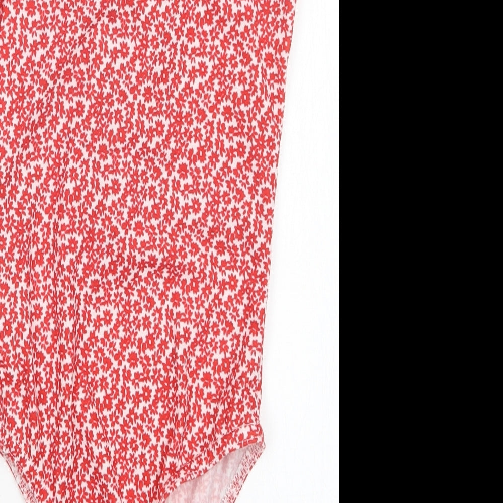 Brand and care label for Missguided women’s red floral bodysuit one-piece, size UK 6