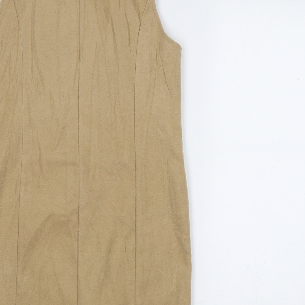 Brand and care label for Missguided women’s beige overcoat waistcoat, size UK 8