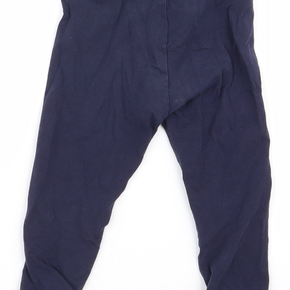 Brand and care label for m girls’ blue jogger trousers, size 12-18, months - legging