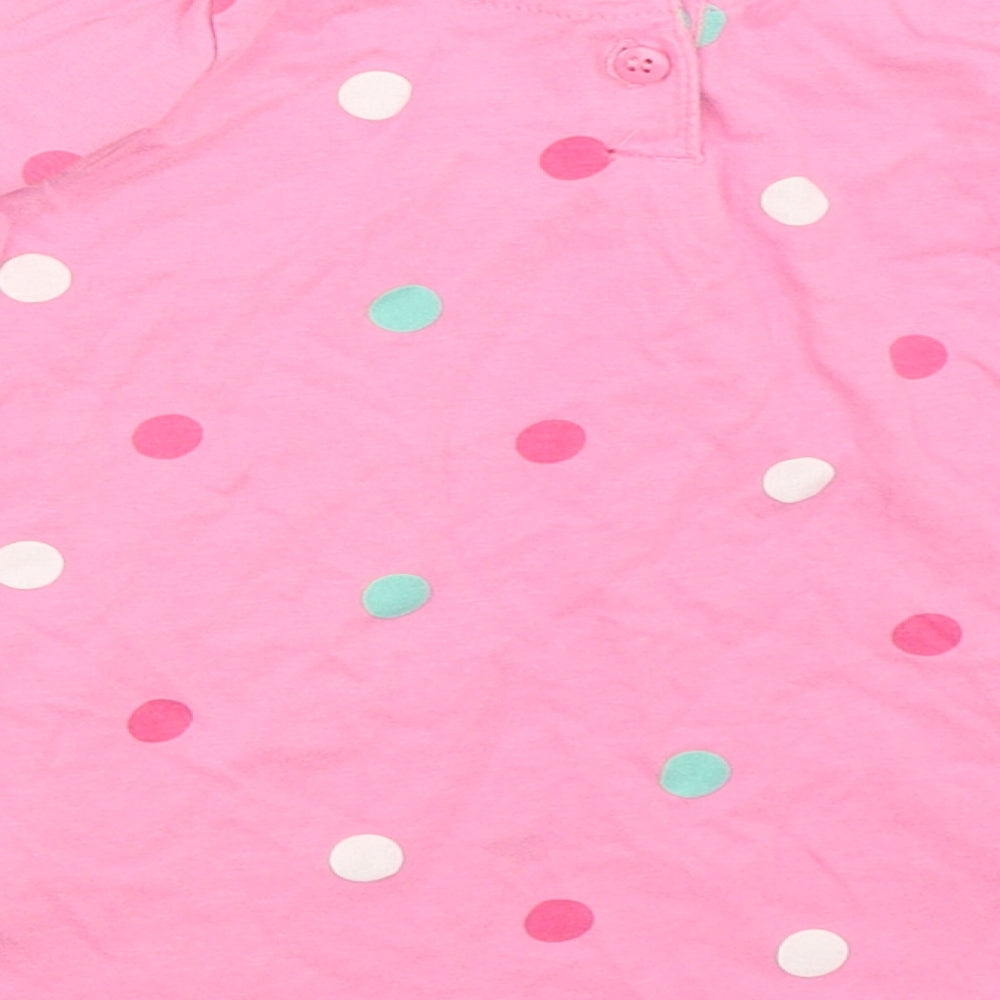 Brand and care label for Mothercare girls’ pink polka dot fit & flare, size 6-9, months