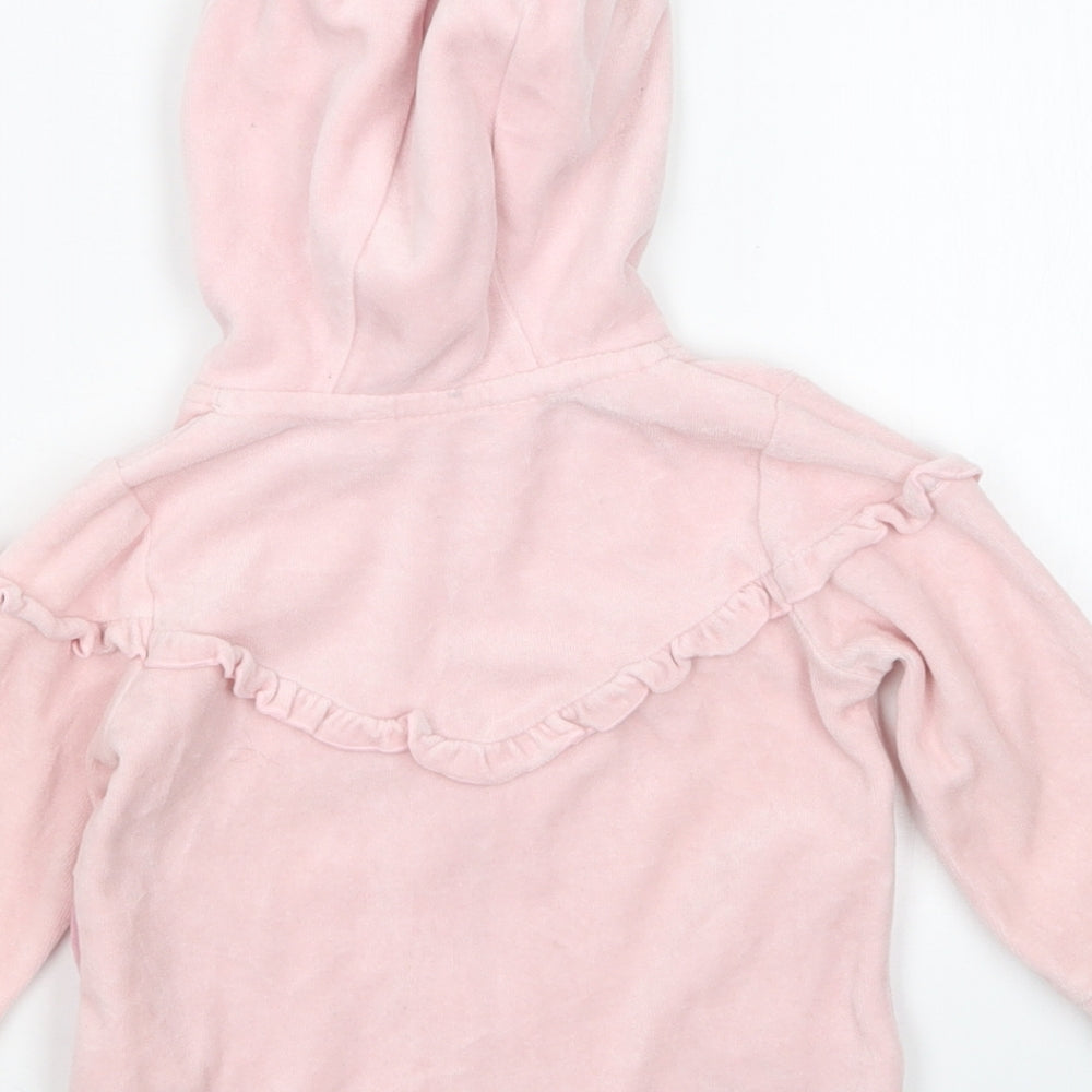 Brand and care label for coccodrillo girls’ pink full zip jumper, size 6-9, months