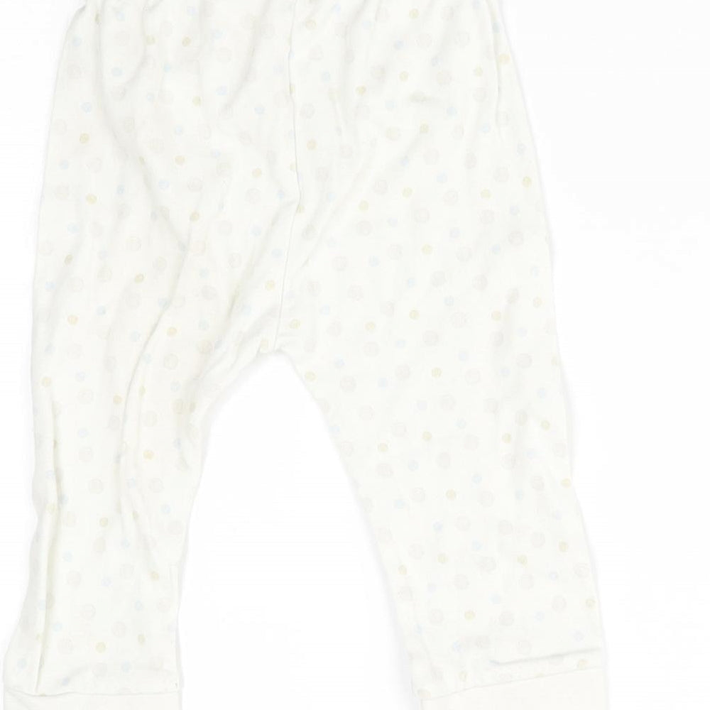 Brand and care label for Disney Baby White Spotted Pyjama Pants, size 6-9, Months
