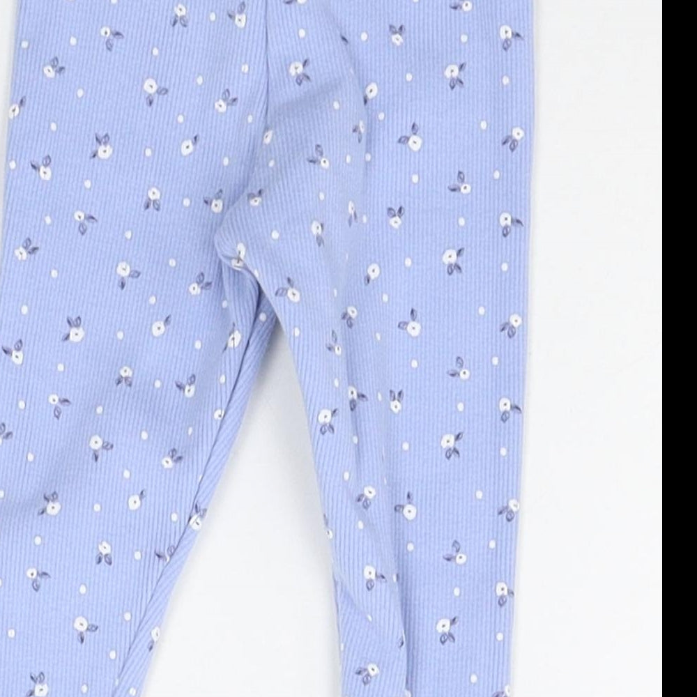 Brand and care label for Primark Baby Blue Geometric Jogger Trousers, size 6-9, Months