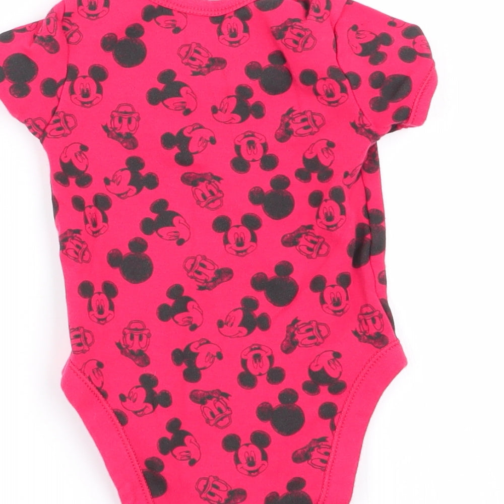 Brand and care label for Asda George boys’ red animal print babygrow one-piece, size 6-9, months - mickey mouse