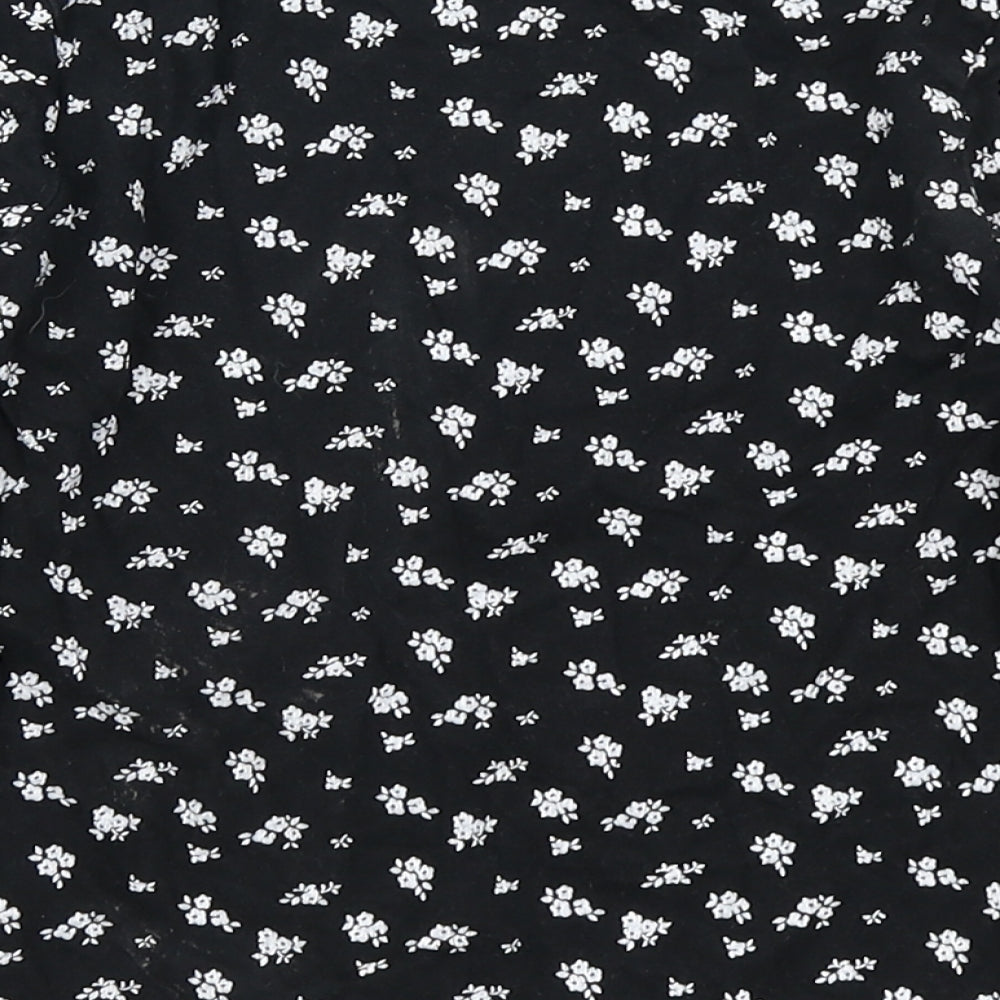Brand and care label for YD girls’ black floral basic t-shirt, size 7-8, years