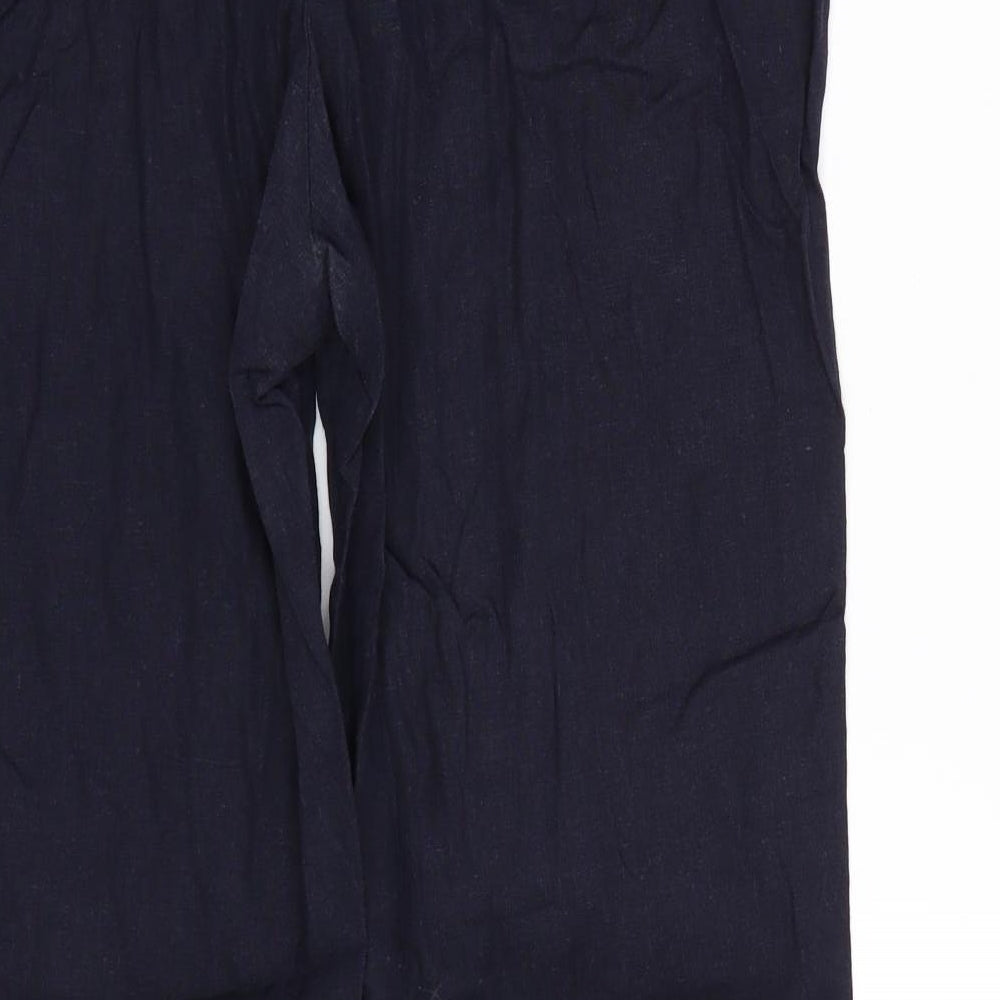Brand and care label for Soon women’s blue trousers, size UK 14, 28-inch leg