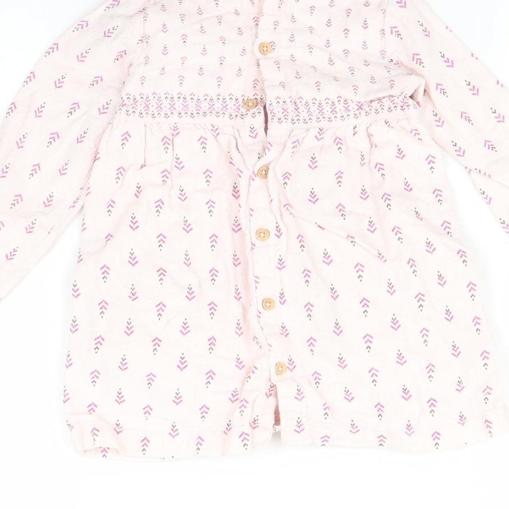 Brand and care label for Sprout Baby Pink Fit & Flare, size 12-18, Months