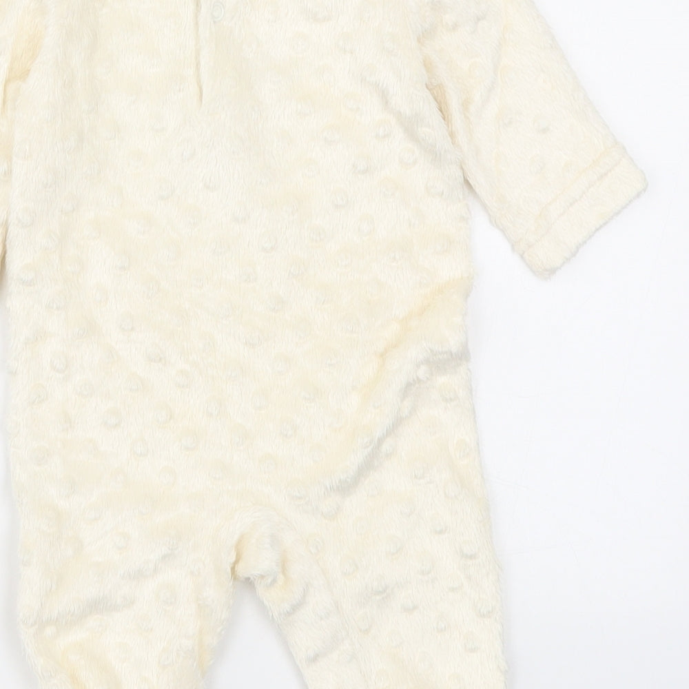 Brand and care label for Rock a Bye Baby Boutique Baby Beige Solid Cami One Piece, size 0-3, Months - Bear