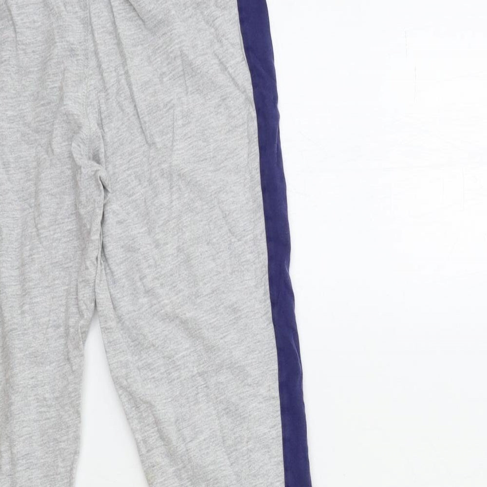 Brand and care label for Next boys’ grey sweatpants, size 9, months