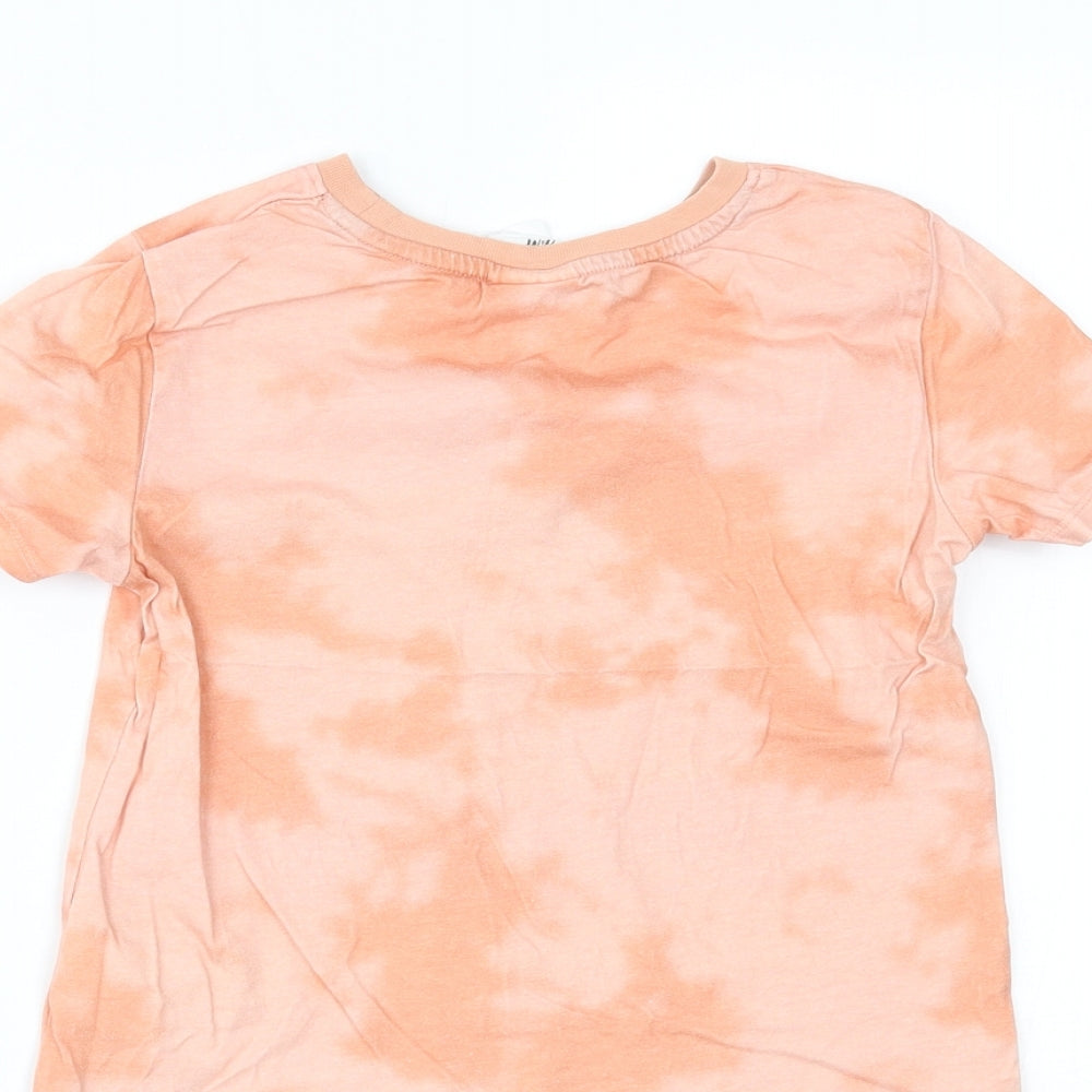 Brand and care label for H&M girls’ orange basic t-shirt, size 5-6, years
