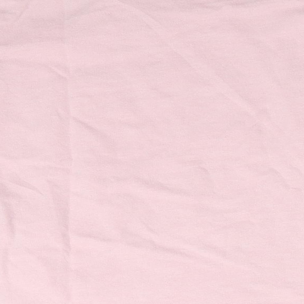 Brand and care label for Kiabi girls’ pink basic casual, size 3-4, years