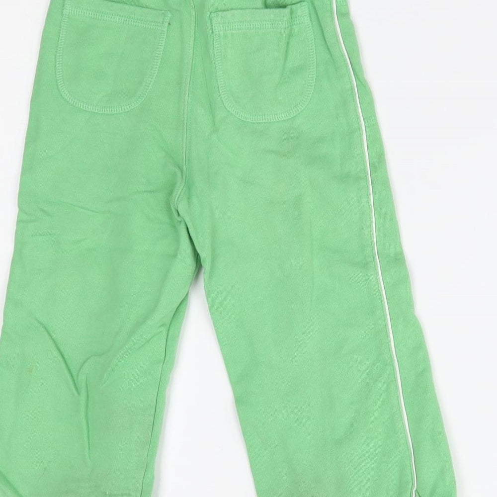 Brand and care label for Next Baby Green Jogger Trousers, size 18-24, Months
