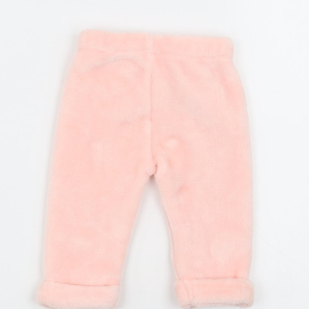 Brand and care label for F&F Baby Pink sweatpants, size 3-6, Months