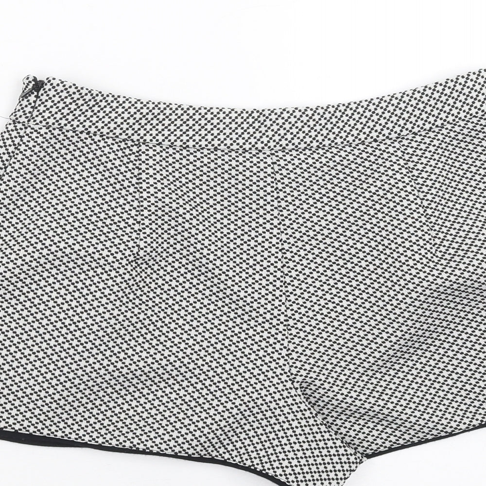 Brand and care label for Miss Selfridge women’s black geometric hot pants shorts, size UK 8