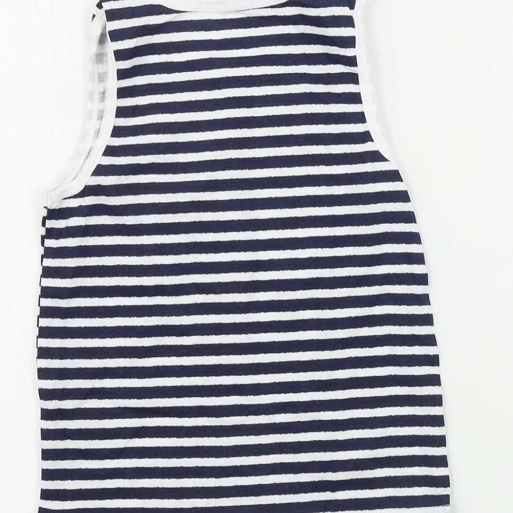 Brand and care label for Primark girls’ white striped basic t-shirt, size 6-7, years
