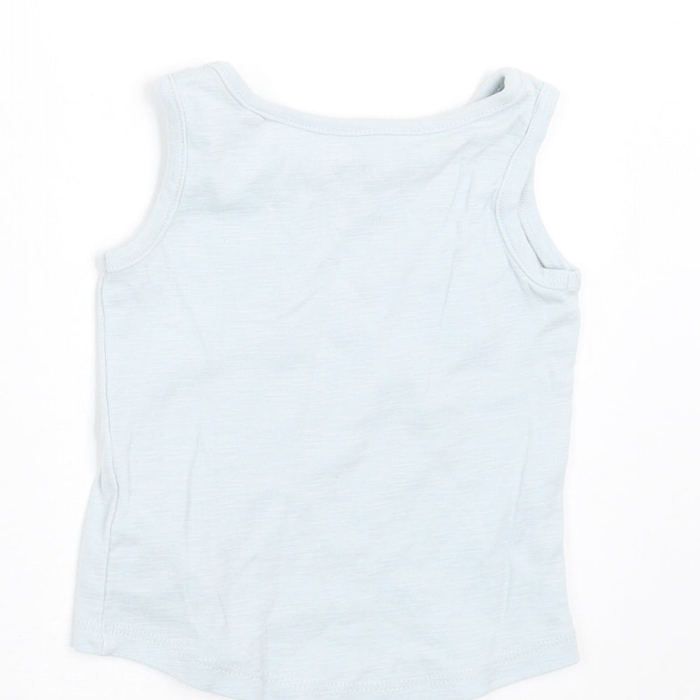 Brand and care label for Next girls’ blue basic tank, size 6-9, months