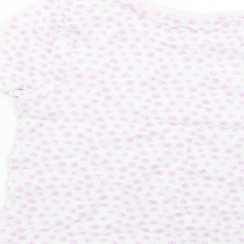 Brand and care label for Matalan girls’ purple floral basic blouse, size 8, years