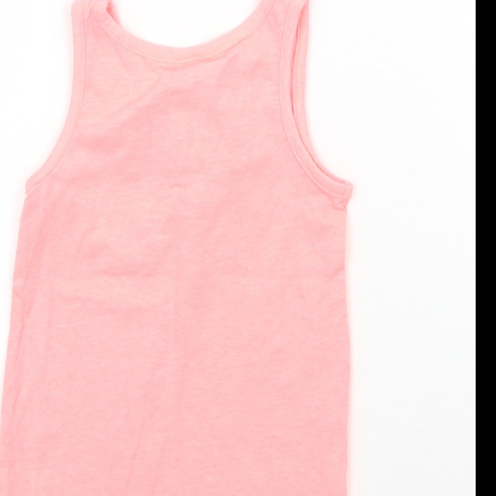 Brand and care label for Palomino girls’ pink basic tank, size 2-3, years