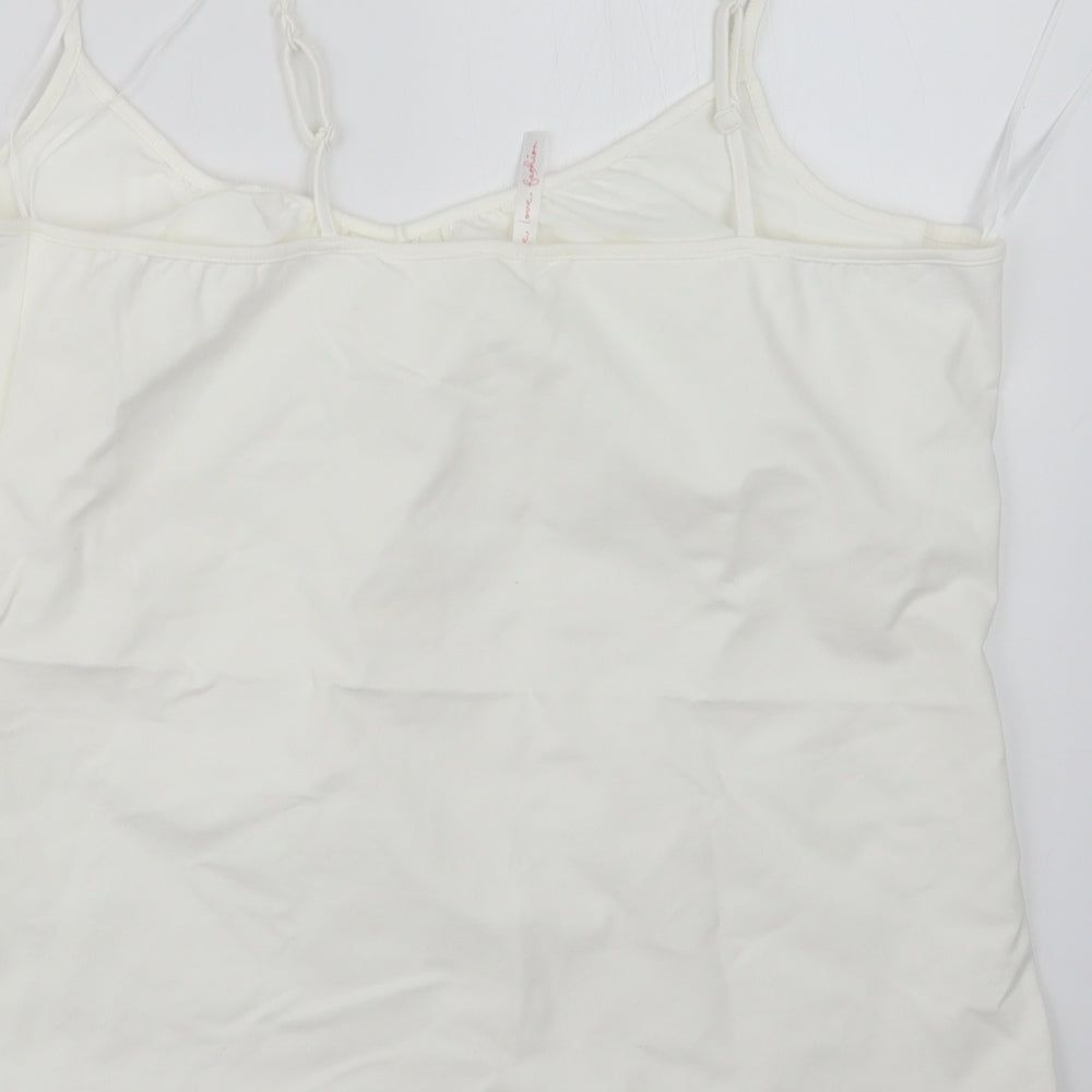 Brand and care label for E-vie women’s white basic tank, size UK 18