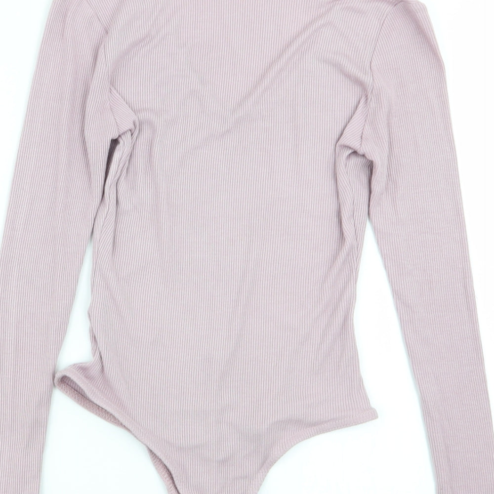 Brand and care label for Missguided women’s pink bodysuit one-piece, size UK 6