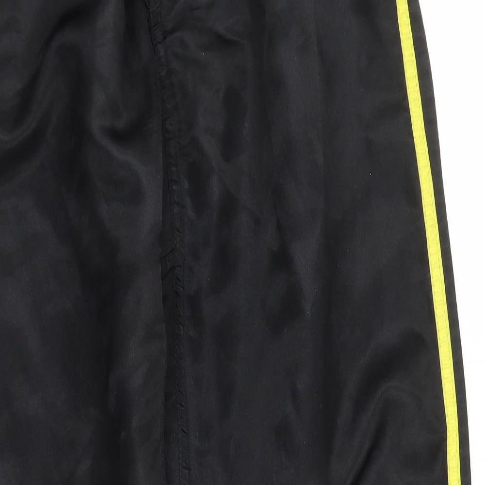 Brand and care label for Rupla boys’ black sweatpants, size 9, months