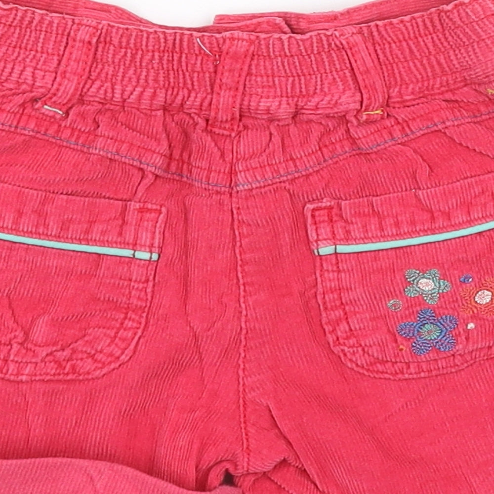 Brand and care label for F&F girls’ pink floral corduroy capri jeans, size 18, months